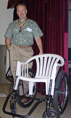 President Sam with wheelchair example